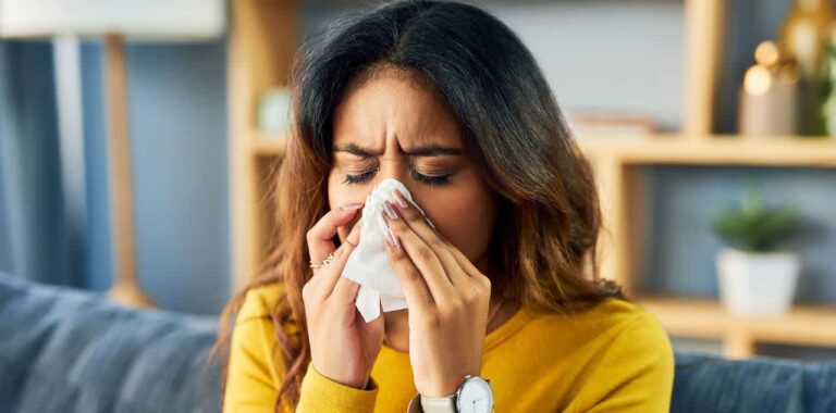 Woman suffering from allergies