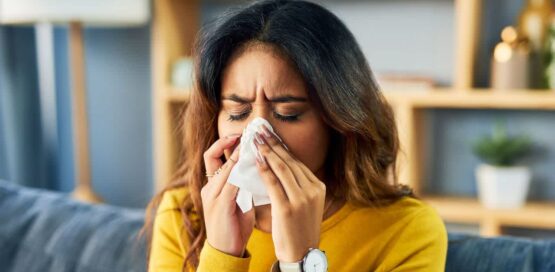 Woman suffering from allergies