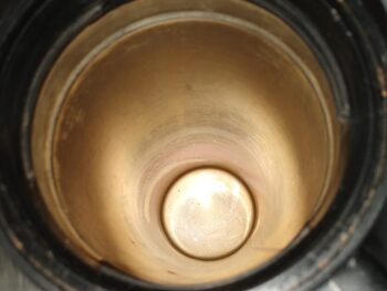 a stainless steel coffee mug is ready for cleaning
