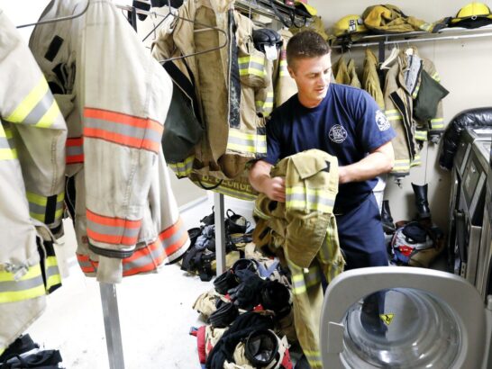 A fireman launders his gear at the station